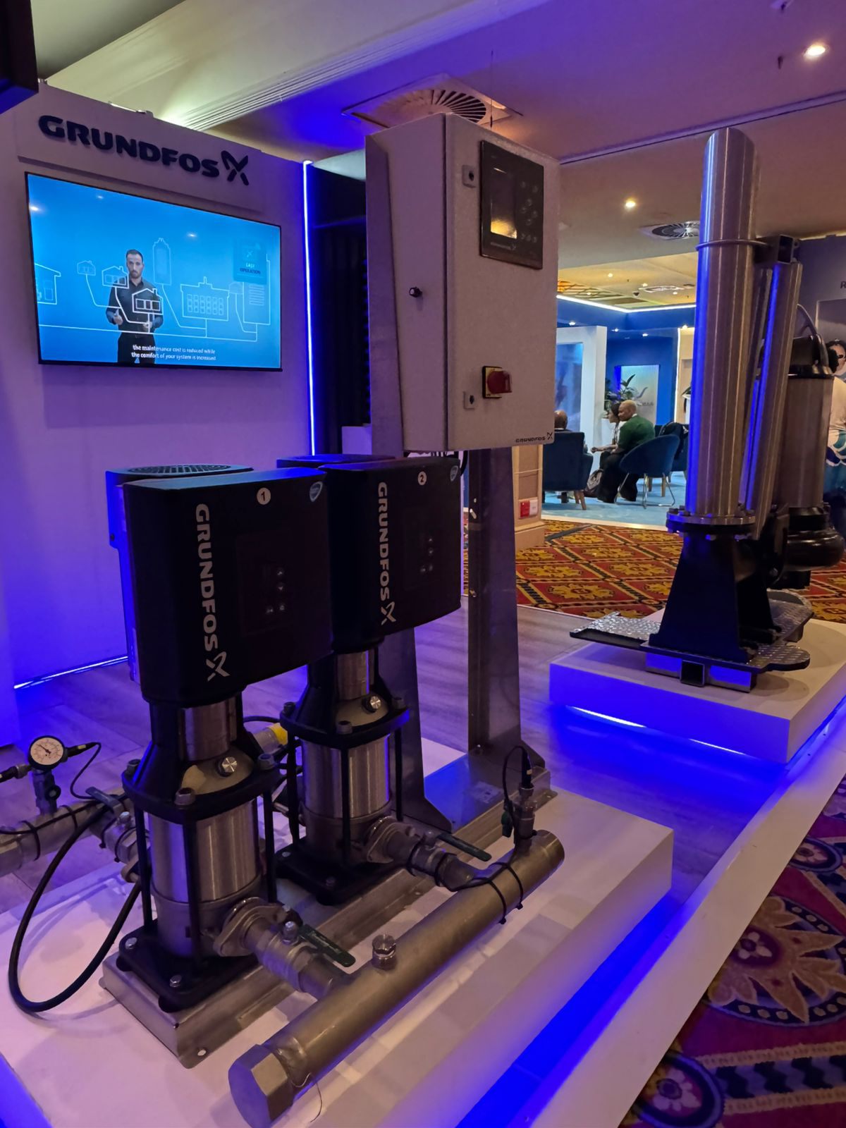 Event technical setup with lighting and screens
